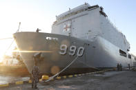 Indonesian navy prepares its hospital ship KRI Dr. Soeharso to join the search for submarine KRI Nanggala that went missing while participating in a training exercise on Wednesday, off Banyuwangi, East Java, Indonesia, Saturday, April 24, 2021. The Indonesian submarine went missing after its last reported dive Wednesday off the resort island, and concern is mounting it may have sunk too deep to reach or recover in time. (AP Photo/Achmad Ibrahim)