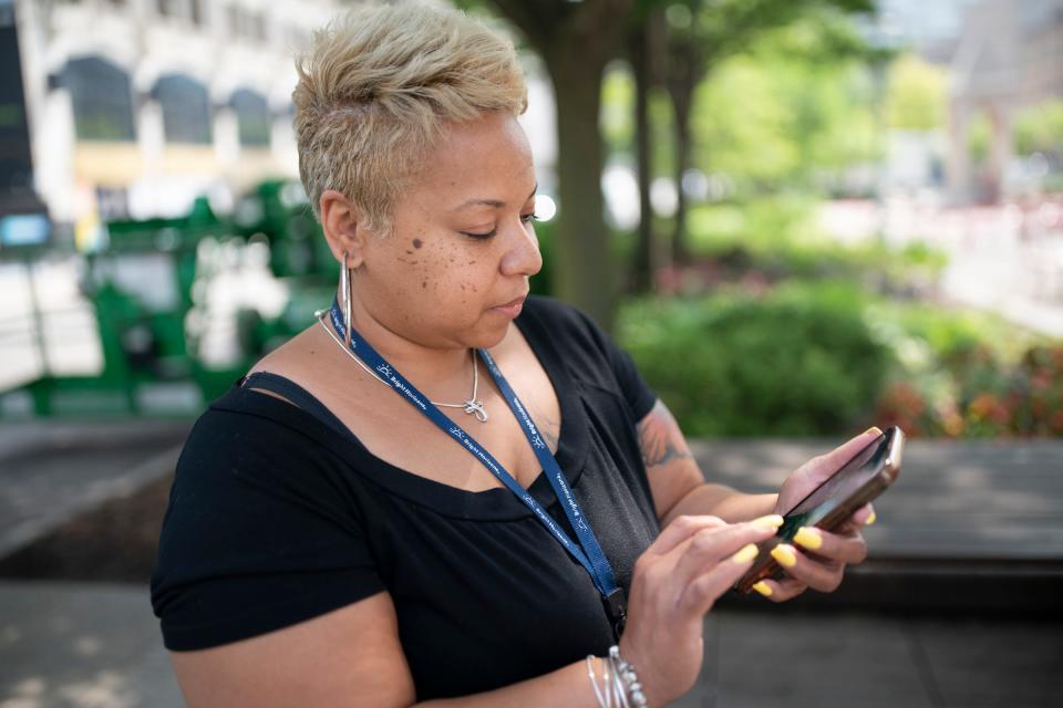 Simonee Williams, 43, of Detroit, is still saddled with a student loan as she looks up her balance on her phone as the Supreme Court in a 6-3 decision struck down President Joe Biden’s student loan forgiveness program Friday, June 29, 2023.