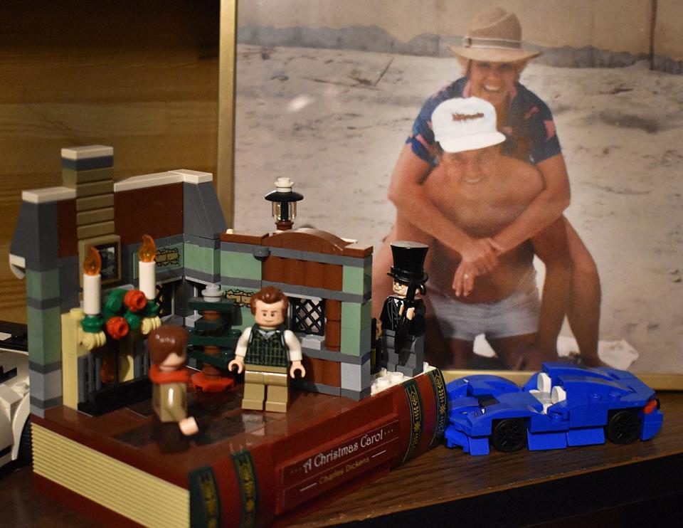 Bob Higgins and wife, Janice, can be seen in this photo near his Lego Christmas Carol set.