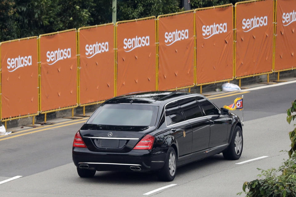 A car carrying North Korean leader Kim Jong Un enters Sentosa island where the summit between him and United States President Donald Trump will take place at the Capella Hotel on Tuesday, June 12, 2018, in Sentosa, Singapore. (AP Photo/Wong Maye-E)