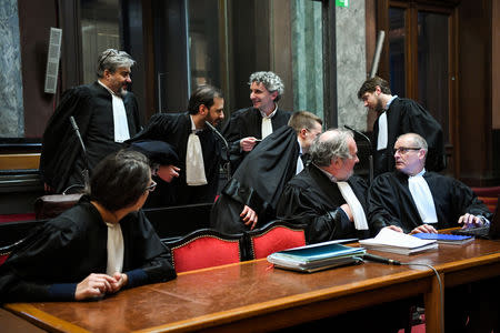 Lawyers wait for the start of the trial of Mehdi Nemmouche and Nacer Bendrer, who are suspected of killing four people in a shooting at Brussels' Jewish Museum in 2014, at Brussels' Palace of Justice, Belgium January 15, 2019. Frederic Sierakowski/Pool via REUTERS