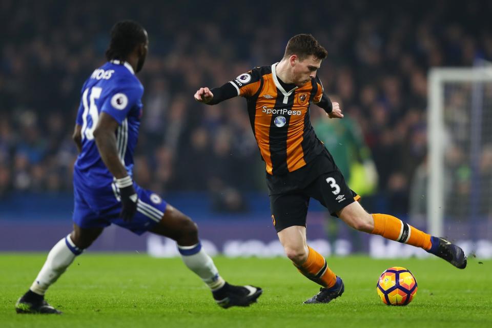 <p>Andrew Robertson takes on fellow wing-back Victor Moses </p>