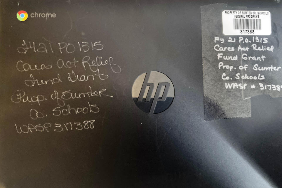 This photo shows an inscribed cover of the Chromebook of Kristen King, a junior at Americus-Sumter High School, in her home in Americus, Ga., March 1, 2021. "It's been challenging," Kristen said. "I like hands-on help from my teachers. We can't really see our friends, like our school friends. We can't really socialize with them. We can't really do anything." (AP Photo/Jeff Amy)