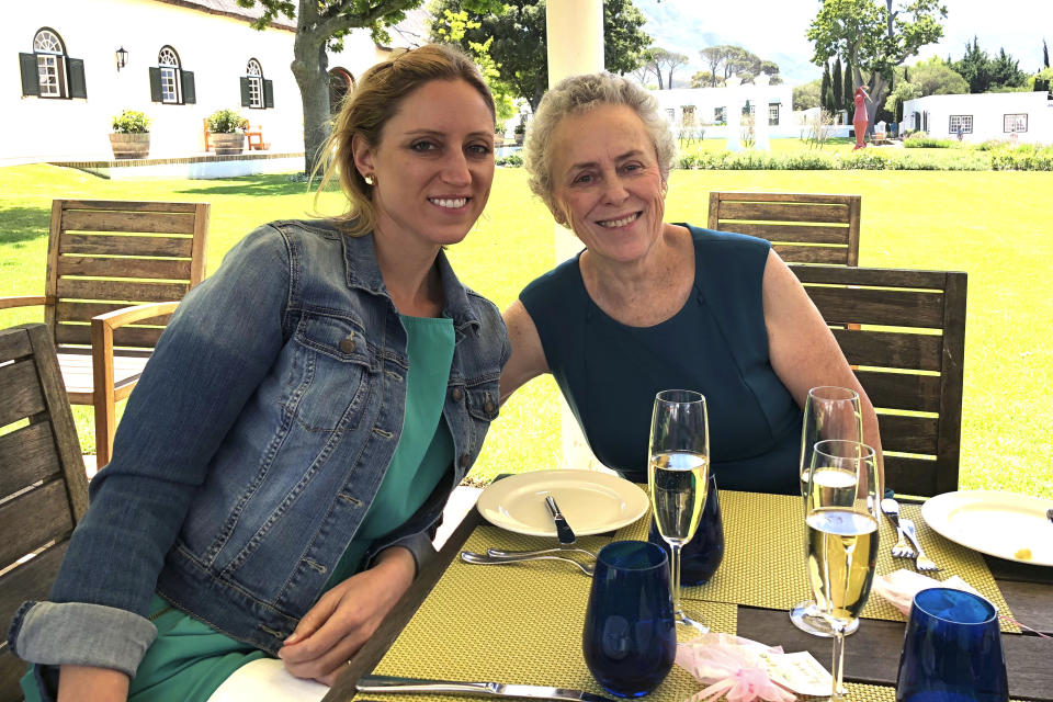 In this undated handout photo, Sarah Depoian poses with her daughter Carolyn Bester. A lawsuit is being filed by Depoian against Dr. Merle Berger, a former Harvard professor and founder of one of the nation's largest fertility clinics for allegedly using his own sperm instead of the sperm of an anonymous donor to impregnate Depoian during an intrauterine insemination procedure. (Photo provided by Sarah Depoian via AP)