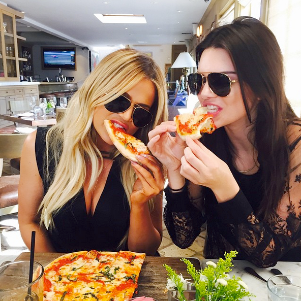 When you’re part of the Kardashian-Jenner family, you’re required to share every moment of your life on Instagram. And that is exactly how this pic of Khloé Kardashian and her model sister Kendall Jenner noshing on pizza at an L.A. restaurant came to be. (Photo: Instagram)