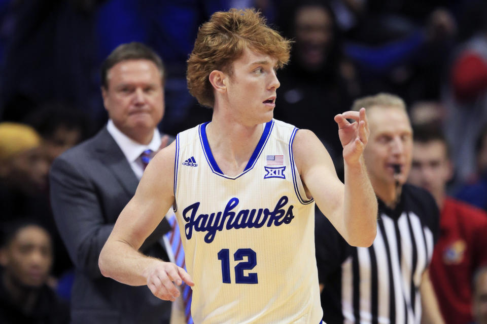 Kansas guard Chris Teahan's desperation heave at the buzzer against Baylor was meaningful to some. (AP Photo/Orlin Wagner)