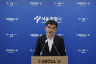 Seoul Metropolitan Government spokesperson Hwang In-sik speaks to the media at Seoul City Hall in Seoul, South Korea, Wednesday, July 15, 2020. The city government of the South Korean capital, Seoul, said Wednesday it will launch an investigation into allegations of sexual misconduct surrounding late Mayor Park Won-soon, who was found dead after one of his secretaries filed a complaint claiming yearslong abuse. (AP Photo/Lee Jin-man)