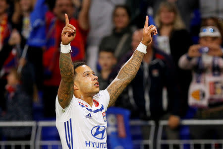 Soccer Football - Ligue 1 - Olympique Lyonnais vs OGC Nice - Groupama Stadium, Lyon, France - May 19, 2018 Lyon's Memphis Depay celebrates scoring their second goal REUTERS/Emmanuel Foudrot