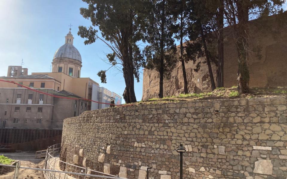 Part of the exterior of the mausoleum, with a Renaissance church in the background - Nick Squires