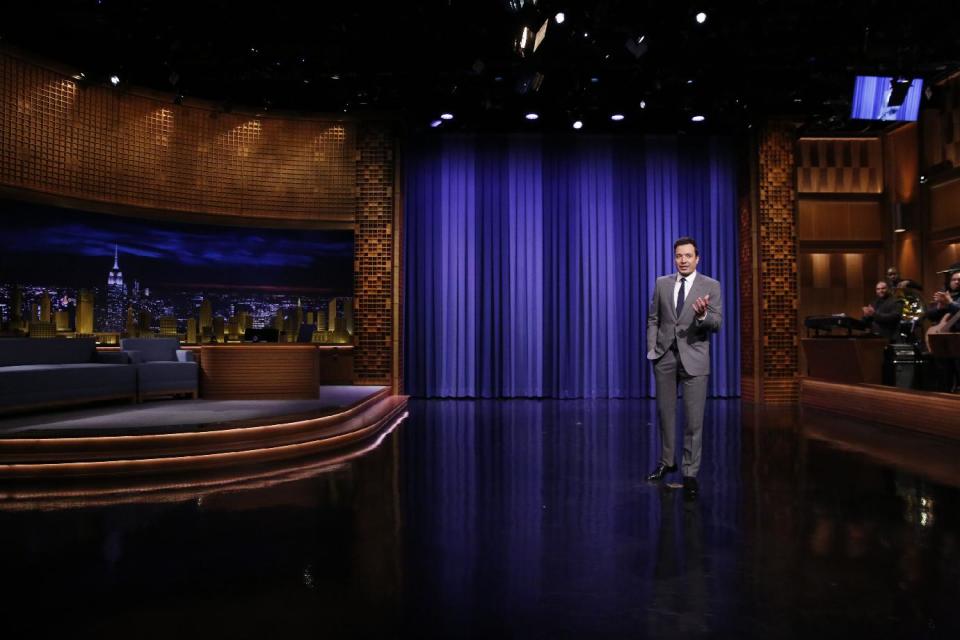 In this photo provided by NBC, Jimmy Fallon appears during his "The Tonight Show" debut on Monday, Feb. 17, 2014, in New York. Fallon departed from the network's “Late Night” on Feb. 7, 2014, after five years as host, and is now the host of “The Tonight Show,” replacing Jay Leno after 22 years. (AP Photo/NBC, Lloyd Bishop)