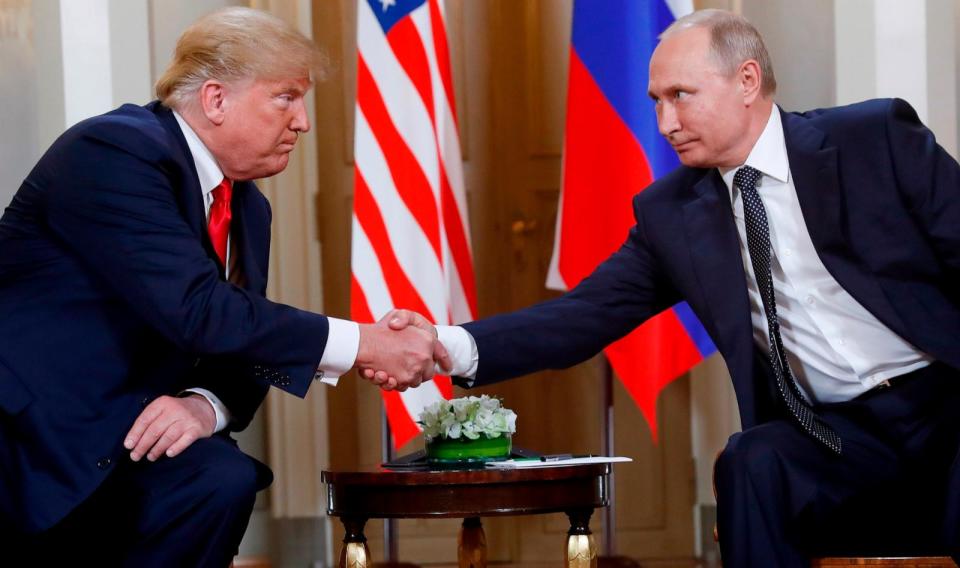 PHOTO: In this July 16, 2018, file photo, former President Donald Trump, left, and Russian President Vladimir Putin shake hands at the beginning of a meeting at the Presidential Palace in Helsinki, Finland.   (Pablo Martinez Monsivais/AP, FILE)