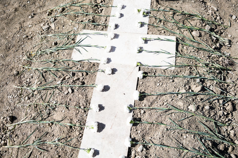 Flowers rest on the fresh grave of an Armenian soldier who was buried in Stepanakert.<span class="copyright">Emanuele Satolli</span>