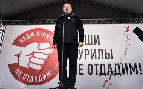 Former eastern Ukraine separatist commander Igor Strelkov addresses protesters on Sunday - Credit: Alexander Nemenov/AFP/Getty