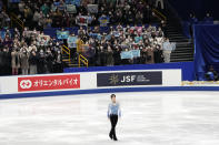 Yuzuru Hanyu of Japan finishes performing during men's short program competition of Japan Figure Skating Championships at Saitama Super Arena, in Saitama, north of Tokyo, Friday, Dec. 24, 2021. (AP Photo/Eugene Hoshiko)