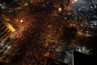 Chilean fans celebrate on the street Chile's victory over Argentina in their Copa America 2015 final soccer match in Santiago, Chile July 4, 2015. REUTERS/Carlos Garcia Rawlins