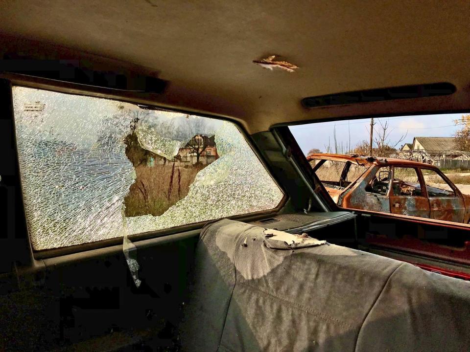 local and international volunteers support the resistance against the russian military in ukraine a destroyed car east of kharkiv