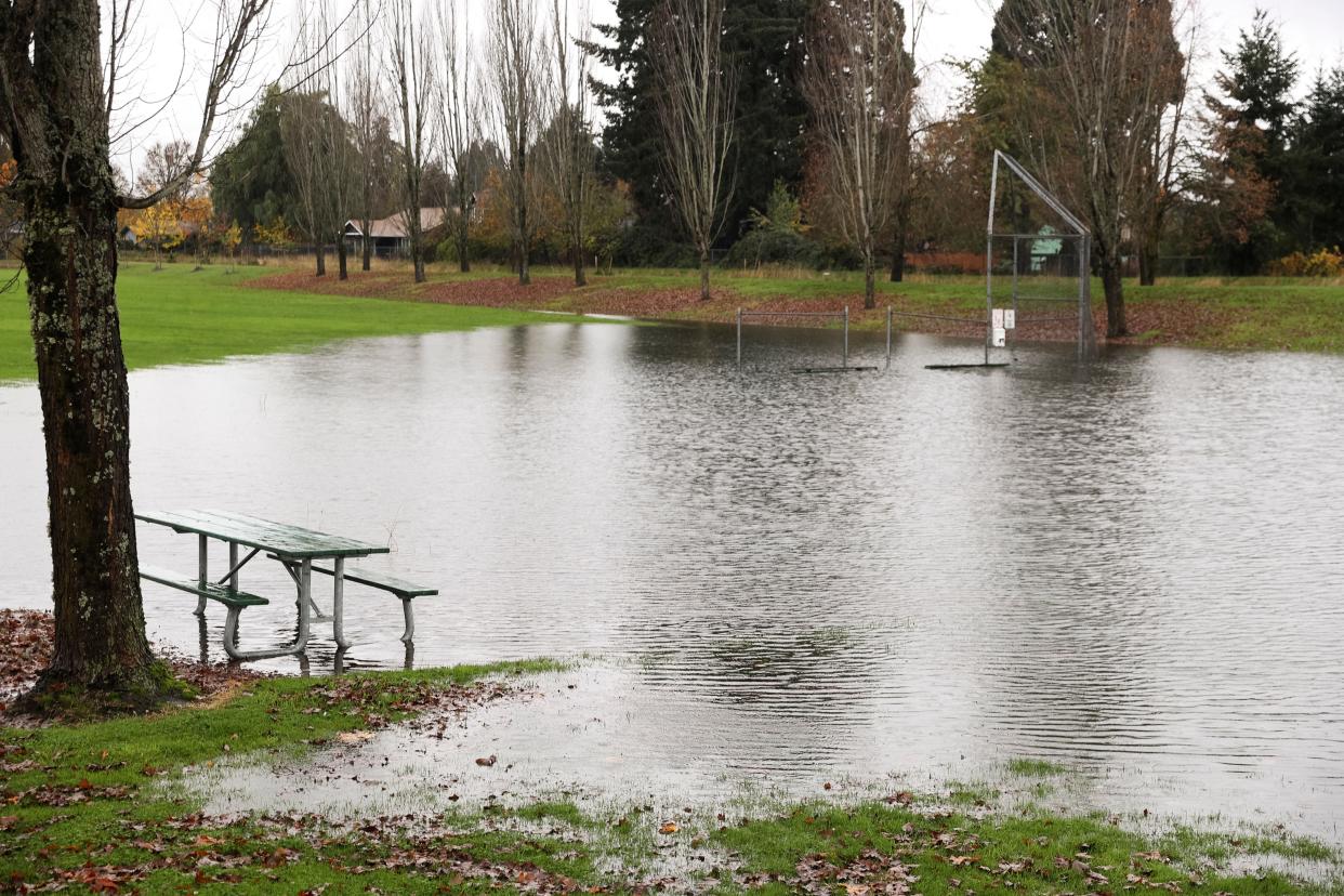 Rainwater floods Lansing Park in Salem, Ore. on Thursday, Nov. 11, 2021.