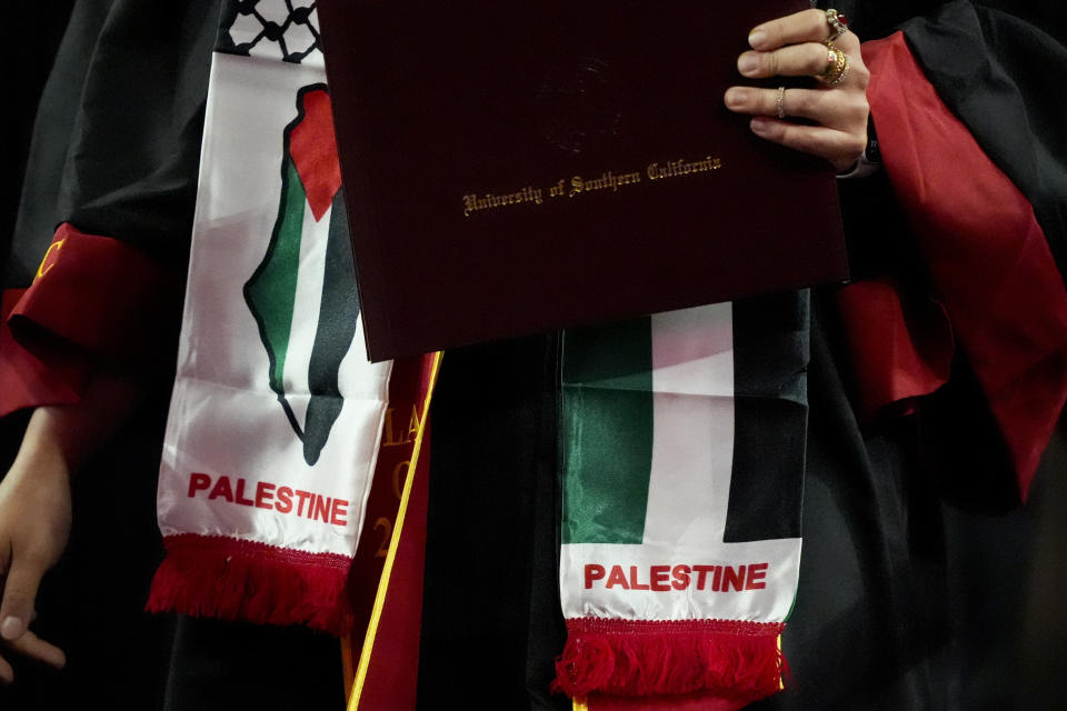 Palestinian insignia are seen on the stole of a graduate during commencement for the University of Southern California's Viterbi School of Engineering Friday, May 10, 2024, in Los Angeles. (AP Photo/Ryan Sun)