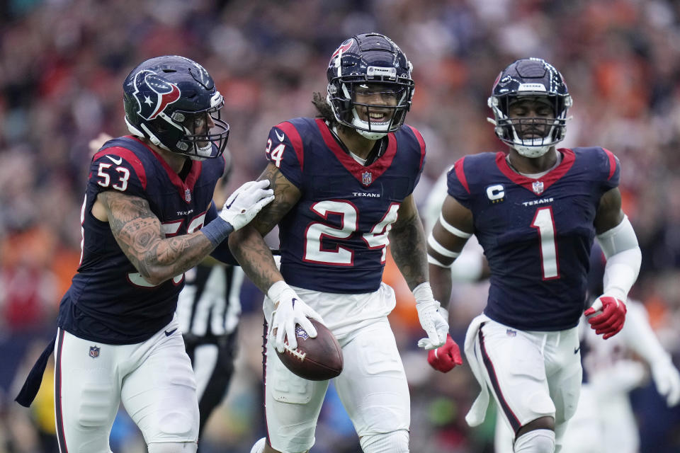 Houston Texans cornerback Derek Stingley Jr. (24) celebrates after intercepting a pass against the Denver Broncos in the second half of an NFL football game Sunday, Dec. 3, 2023, in Houston. (AP Photo/Eric Christian Smith)