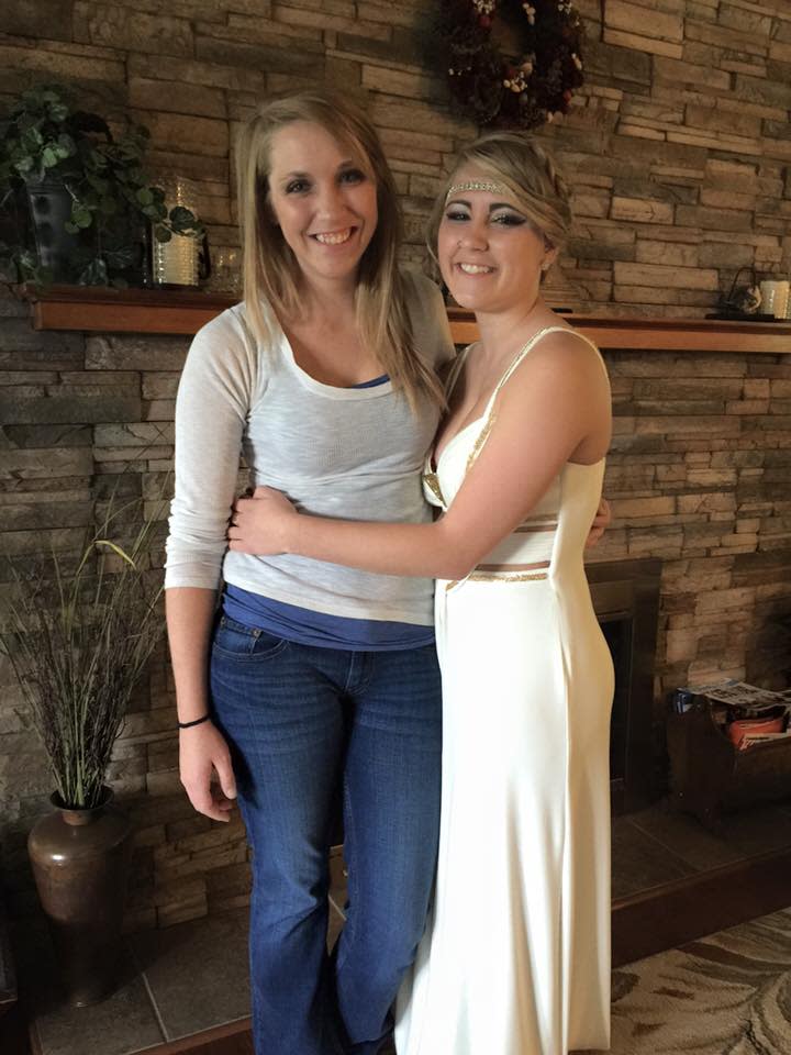 Stephanie Hertzler (left) posed for this photo with her younger sister before Danielle's prom. Stephanie, now 30, lost her mother in 2008 and her sister in 2019.