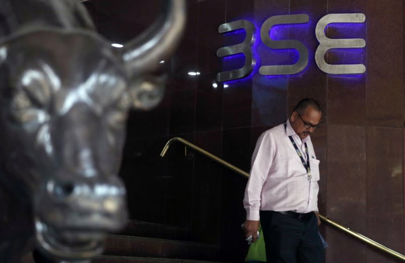 A man walks out of the Bombay Stock Exchange (BSE) building in Mumbai