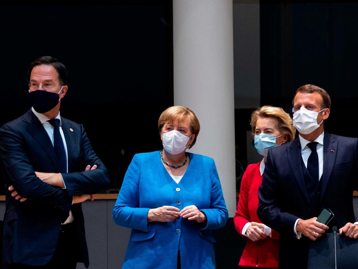 Dutch prime minister Mark Rutte looks on next to Angela Merkel, Ursula von der Leyen and Emmanuel Macron: POOL/AFP via Getty Images