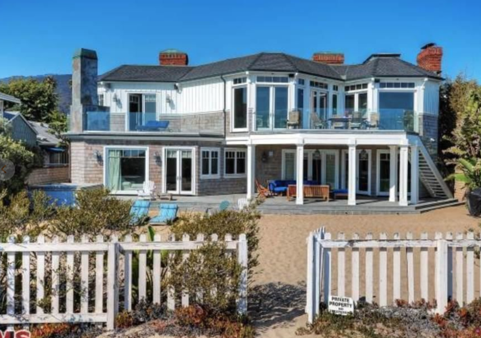 1) The Cape Cod-style home is situated on an 80-foot lot on Broad Beach.
