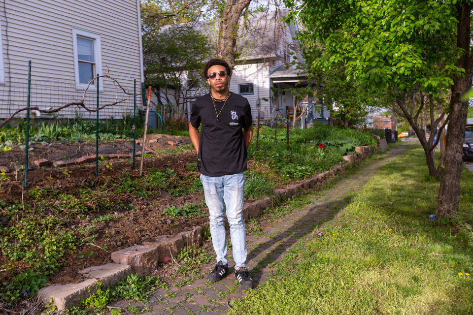 Image: Mate Muhammad in the garden of the house where he lives in Des Moines, Iowa on April 30, 2021. (Rachel Mummey / for NBC News)