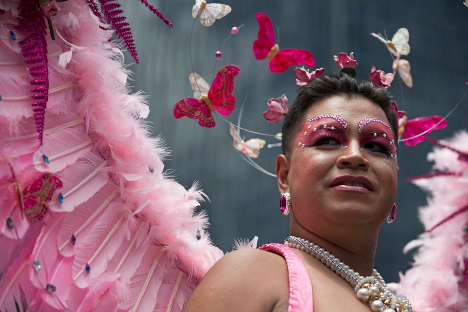 A man wears a costume during Mexico City's annual gay pride parade, June 28, 2014.