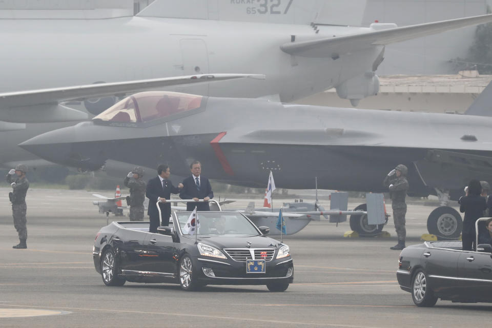 South Korean President Moon Jae-in, center right on vehicle, attends a ceremony for the 71st anniversary of Armed Forces Day at the Air Force Base in Daegu, South Korea Tuesday, Oct. 1, 2019. (Jeon Heon-kyun/Pool Photo via AP)