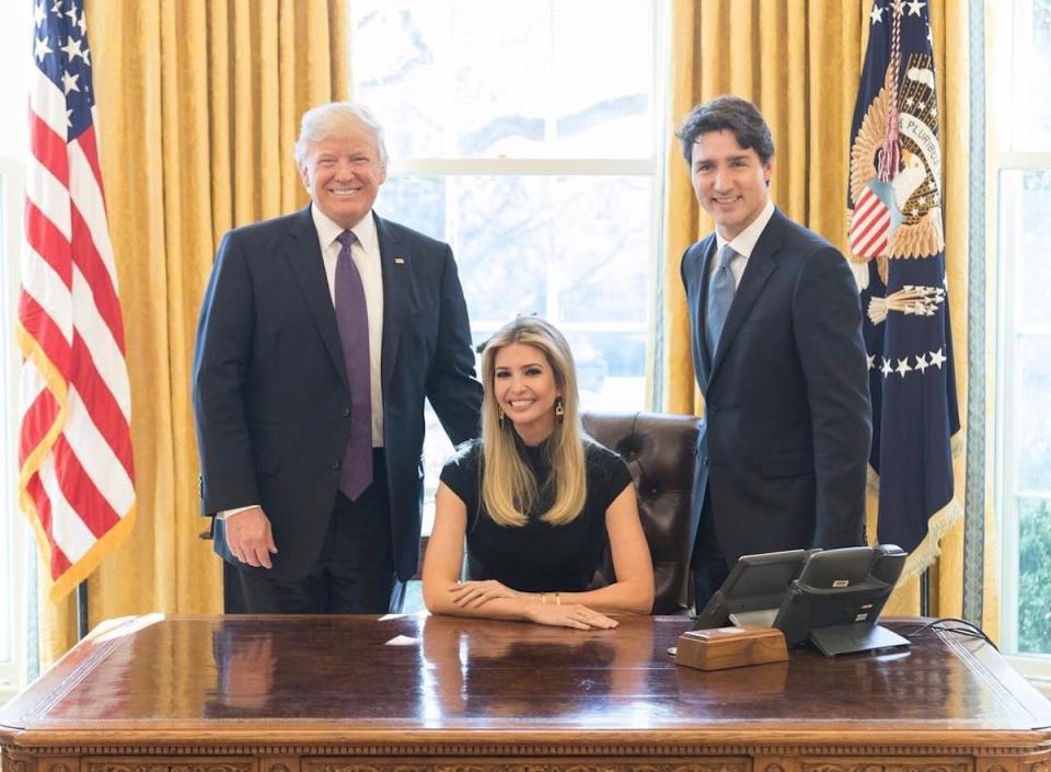 Ivanka Trump in a black dress with President Donald Trump and Canadian Prime Minister Justin Trudeau