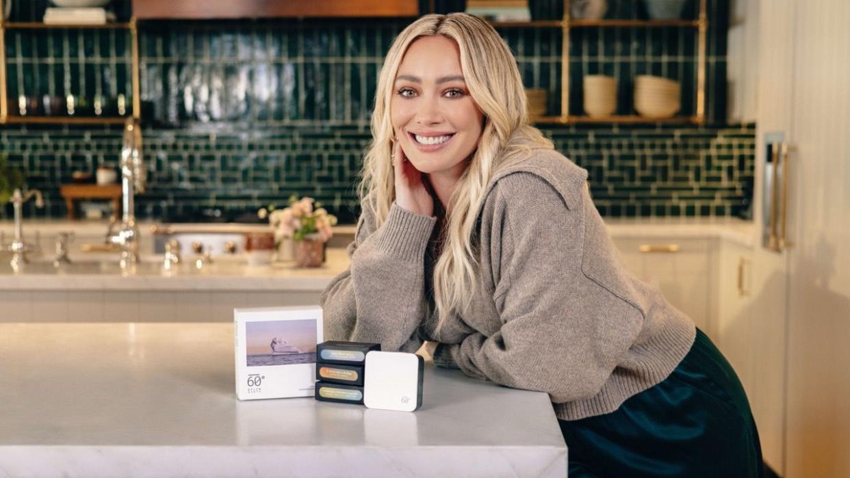 a woman sitting at a counter