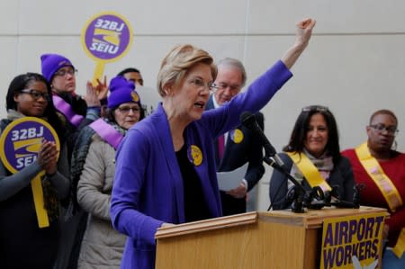 FILE PHOTO: Potential 2020 Democratic presidential candidate Warren speaks about federal government employees working without pay at Logan Airport in Boston