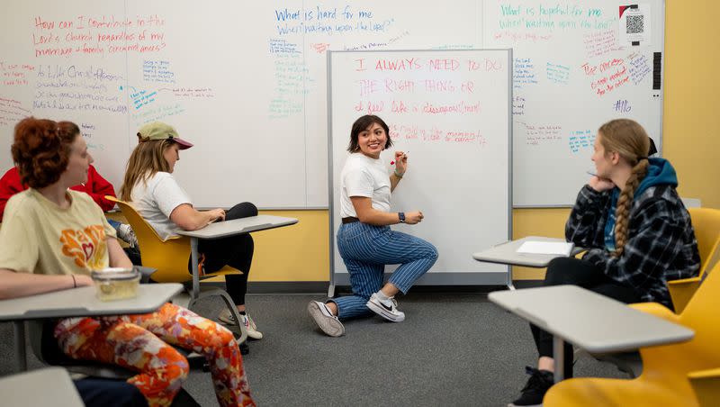 Khayla Murphy writes on a white board during a class called “involving the Savior in your mental and emotional health” at the Institute of Religion at the University of Utah in Salt Lake City on Wednesday, Nov. 15, 2023.