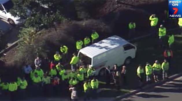 Australia Post workers forced to evacuate from the mail centre at Ingleburn in Sydney's south-west.Photo: First on 7News