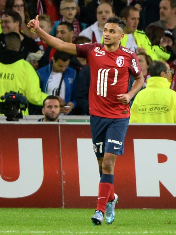 Lille's midfielder Sofiane Boufal (C) celebrates after scoring a goal against Montpellier on October 2, 2015