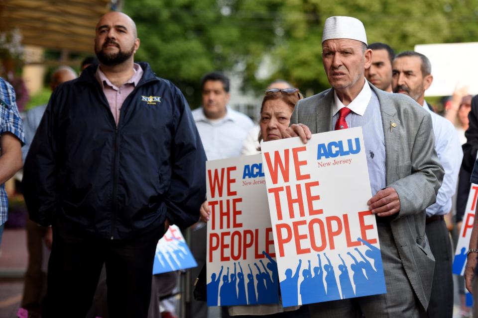 Mohamed Khairullah, left, mayor of Prospect Park, N.J., was among those who attended a June 2018 rally outside the Islamic Center of Passaic County in Paterson, N.J., protesting a Supreme Court ruling upholding a travel ban issued in 2017 by President Donald Trump on travelers from several majority-Muslim countries.