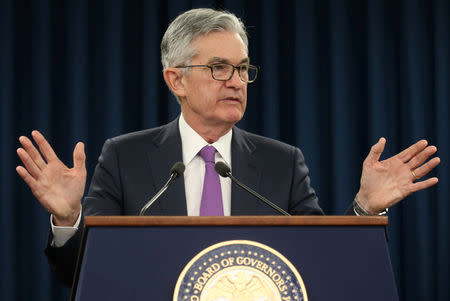 FILE PHOTO: Federal Reserve Chairman Jerome Powell holds a press conference following a two day Federal Open Market Committee policy meeting in Washington, U.S., January 30, 2019. REUTERS/Leah Millis -/File Photo