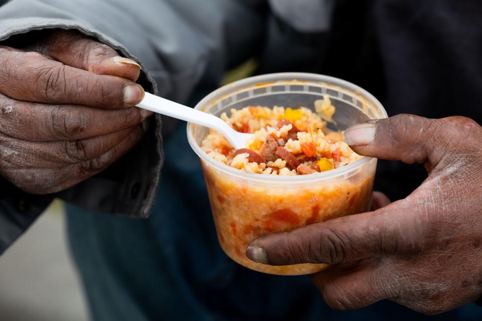 One of the homies eats homemade jambalaya in Salt Lake City on Thursday, Feb. 1, 2024. Be a Little Too Kind is a nonprofit organization focused on assisting homeless people by providing a homemade meal every week and other essential life sustaining items. | Megan Nielsen, Deseret News