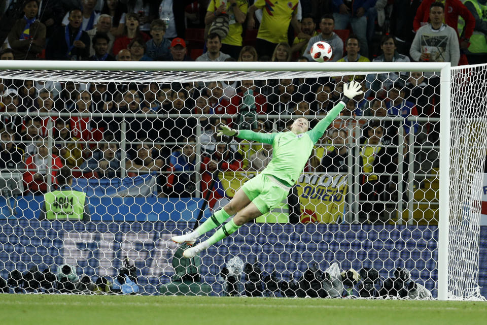 <p>England goalkeeper Jordan Pickford goes airborne to make a save a powerful shot from Mateus Uribe. But from the resutling corner…. </p>