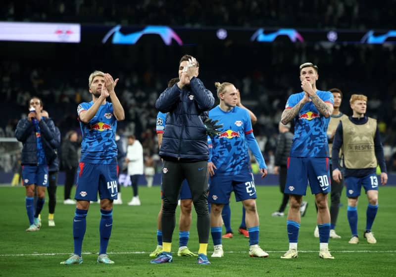Leipzig players thank their supporters after the UEFA Champions League round of 16 second leg soccer match between Real Madrid and RB Leipzig at Santiago Bernabeu Stadium. Jan Woitas/dpa