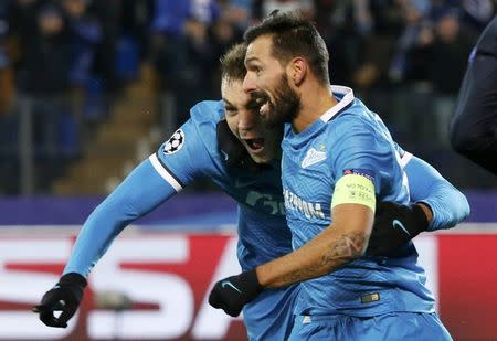 Football Soccer - Zenit St. Petersburg v Valencia - Champions League Group Stage - Group H - Petrovsky stadium, St. Petersburg, Russia - 24/11/2015 Zenit St. Peterburg's Artem Dzyuba celebrates with his team mate Danny after scoring the second goal for Valencia REUTERS/Grigory Dukor