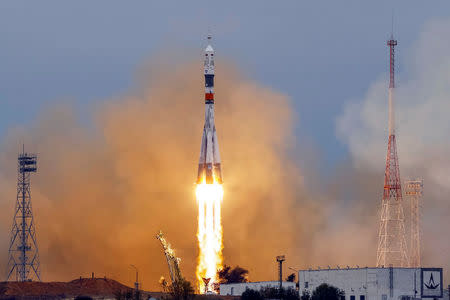 The Soyuz MS-02 spacecraft carrying the crew of Shane Kimbrough of the U.S., Sergey Ryzhikov and Andrey Borisenko of Russia blasts off to the International Space Station (ISS) from the launchpad at the Baikonur cosmodrome, Kazakhstan, October 19, 2016. REUTERS/Shamil Zhumatov