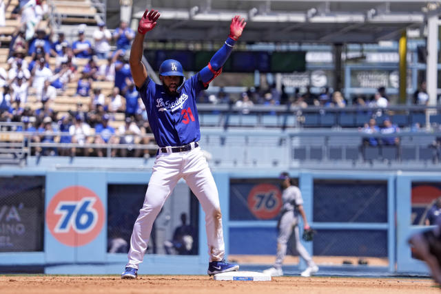 Julio Urías strikes out 12 while the Dodgers rout the Rockies 8-3