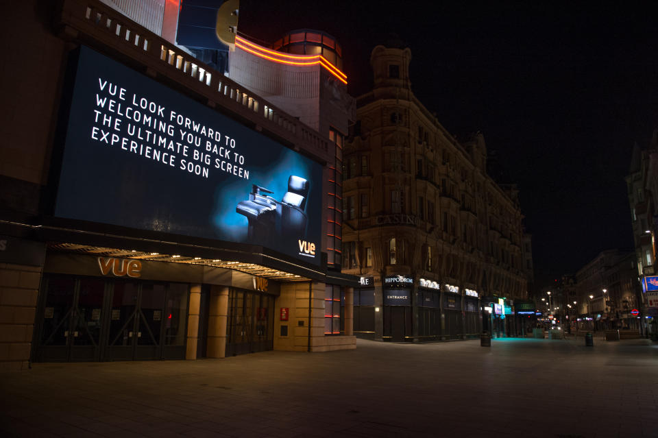 LONDON, ENGLAND - MARCH 24:An empty Leicester Square in central London on March 24, 2020 in London. British Prime Minister, Boris Johnson, announced strict lockdown measures urging people to stay at home and only leave the house for basic food shopping, exercise once a day and essential travel to and from work. The Coronavirus (COVID-19) pandemic has spread to at least 182 countries, claiming over 17,000 lives and infecting hundreds of thousands more. (Photo by Ollie Millington/Getty Images)