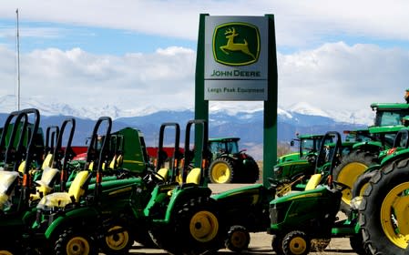 FILE PHOTO: John Deere tractors are seen for sale at a dealer in Longmont