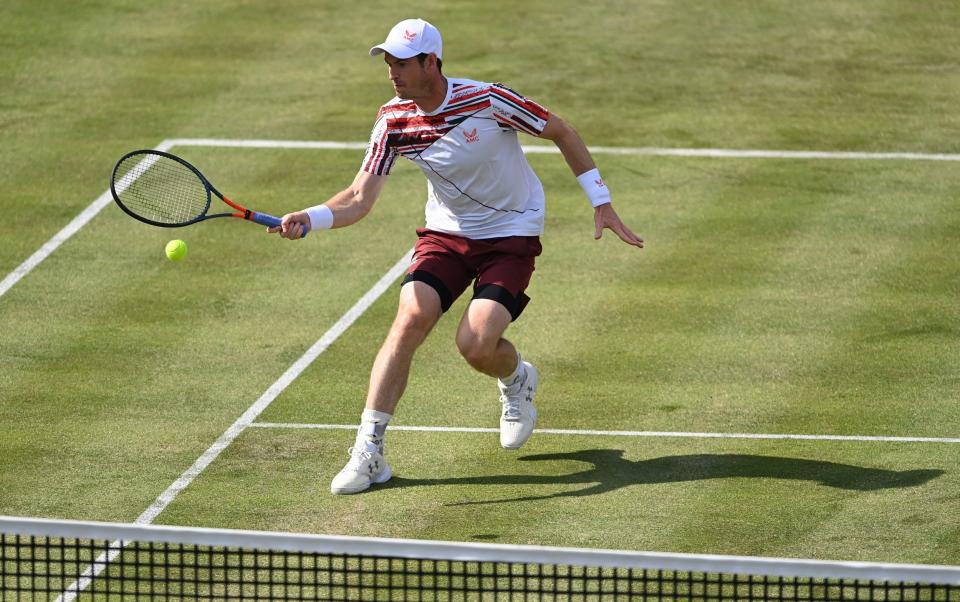  Andy Murray of Great Britain plays a forehand during his First Round match against BenoÃ®t Paire of France during Day 2 of the cinch Championships at The Queen's Club on June 15, 2021 in London, England - Getty Images Europe 