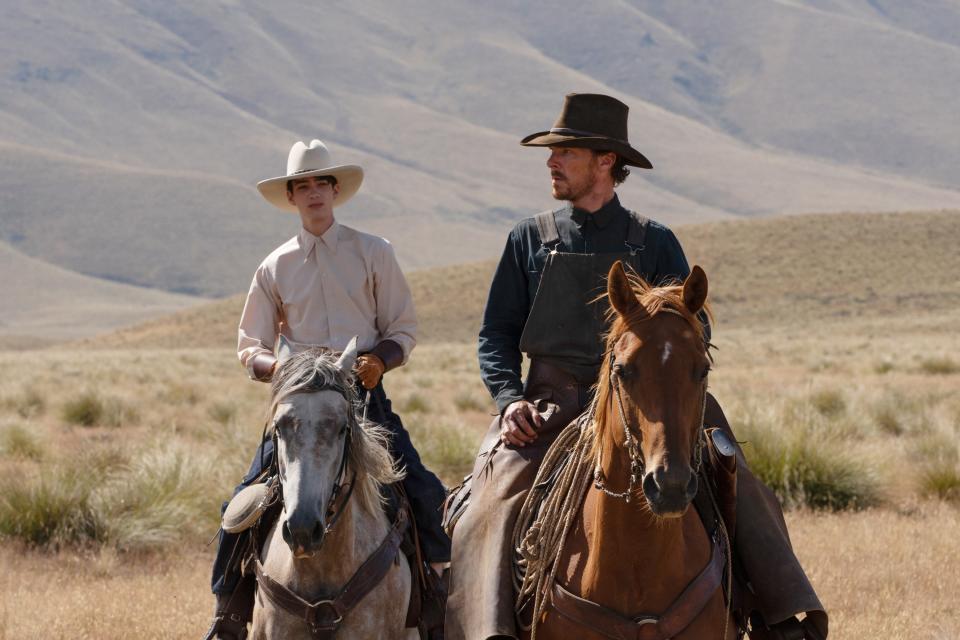 Kodi Smit-McPhee and Benedict on horseback in "The Power of the Dog"