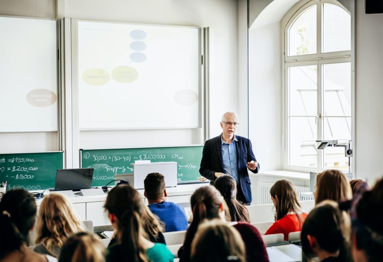 <span class="caption">In the 2018-2019 academic school year, 45.1% of professors at U.S. colleges and universities overall had tenure.</span> <span class="attribution"><a class="link " href="https://www.gettyimages.com/detail/photo/university-lecturer-addressing-his-students-royalty-free-image/871711634?adppopup=true" rel="nofollow noopener" target="_blank" data-ylk="slk:Tom Werner/DigitalVision;elm:context_link;itc:0;sec:content-canvas">Tom Werner/DigitalVision</a></span>