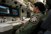 In preparation for an unarmed Minuteman III intercontinental ballistic missile launch, 1st Lt. Kimberly Erskine, Missile Combat Crew commander from Malmstrom Air Force Base, practices procedures at Vandenberg Air Force Base, California, U.S., March 19, 2015. Picture taken March 19, 2015. U.S. Air Force/Michael Peterson/Handout via REUTERS